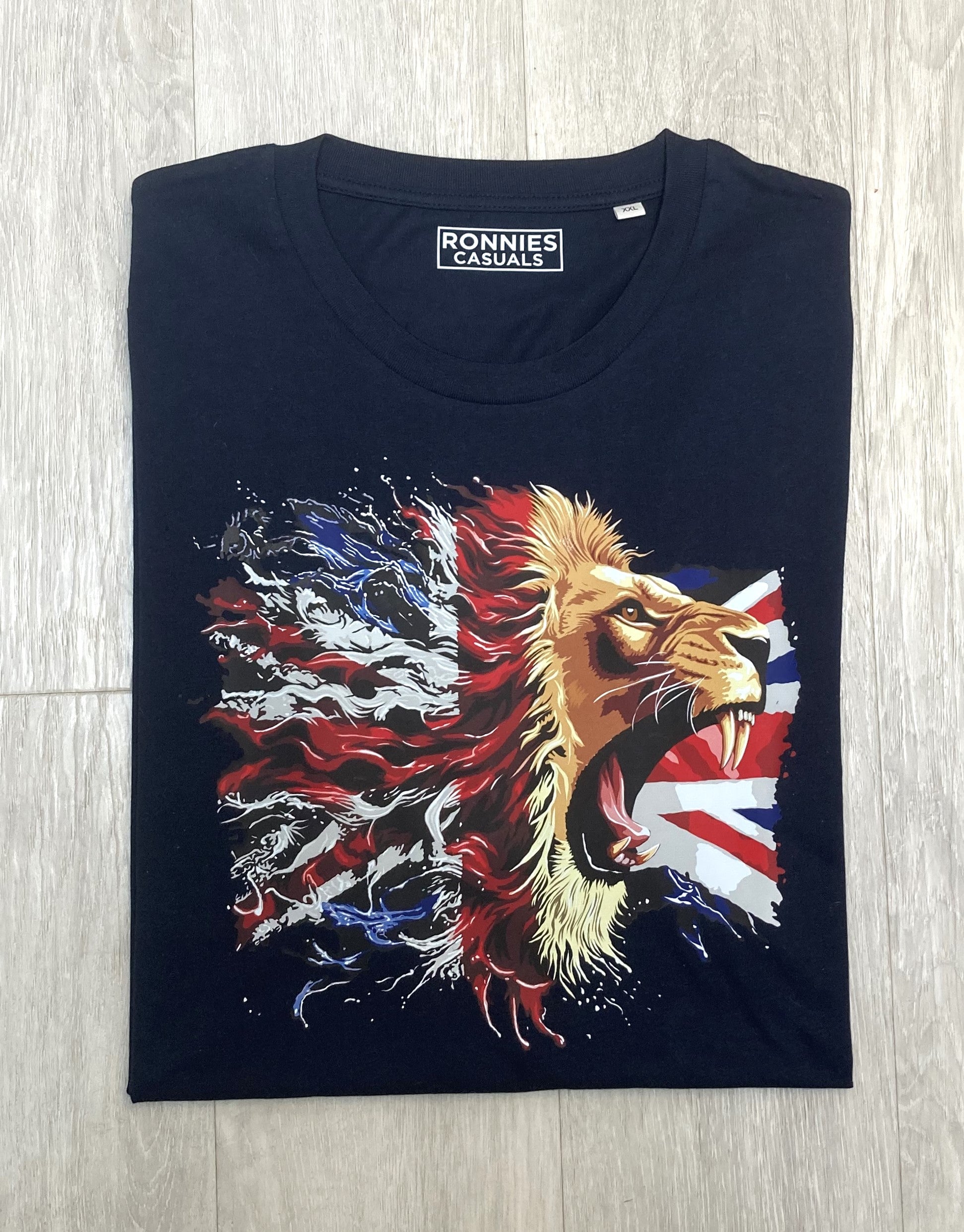 Ronnies Casuals Lions Heart design Navy t-shirt. The iconic Great British flag alongside a fierce, roaring lion’s face in S, M, L, XL, XXL and XXXL. 