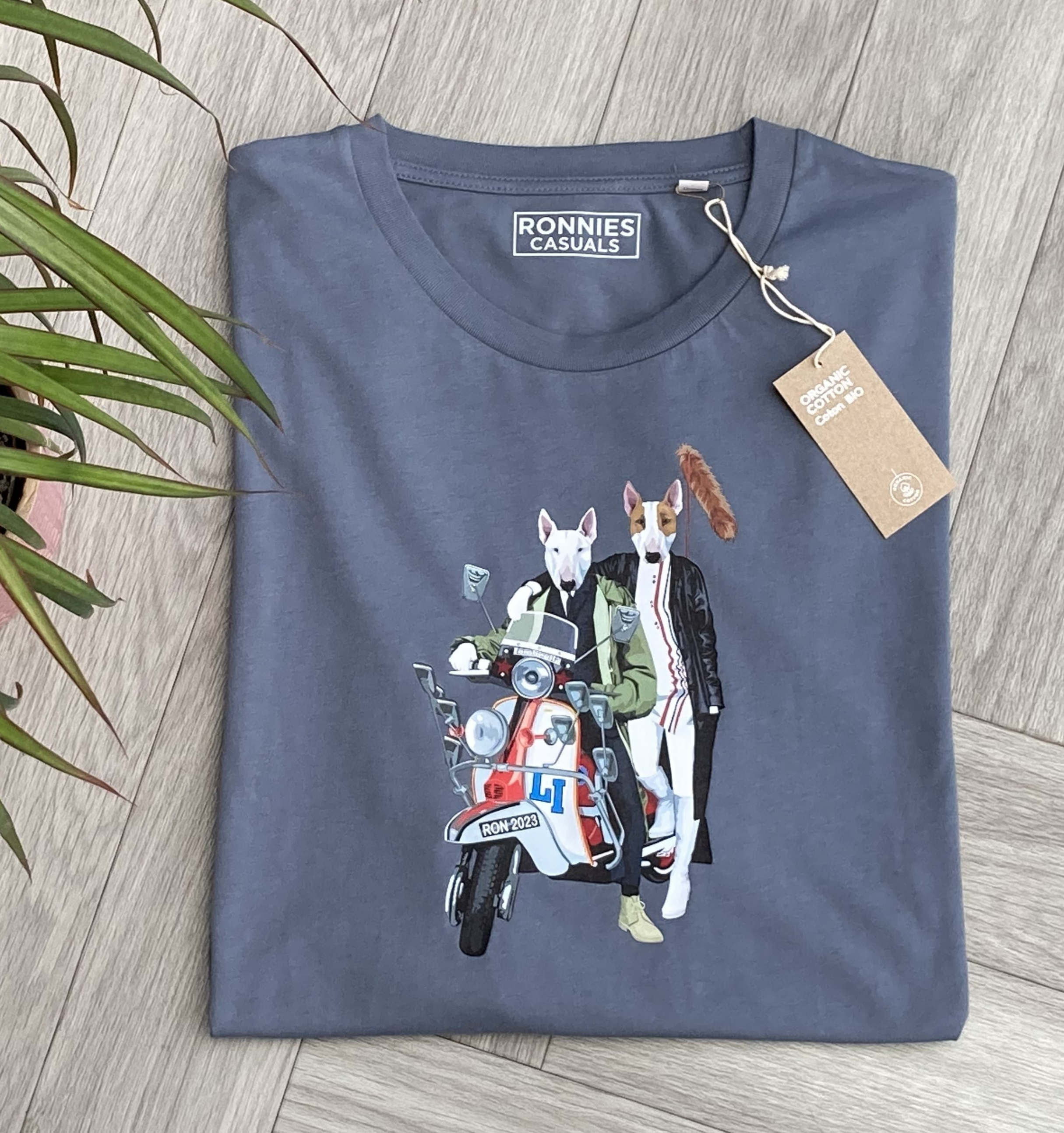 Mineral Grey T-shirt printed with a Boy and Girl English Bull Terrier Dogs Sitting on a classic Scooter with a foxtail on the back