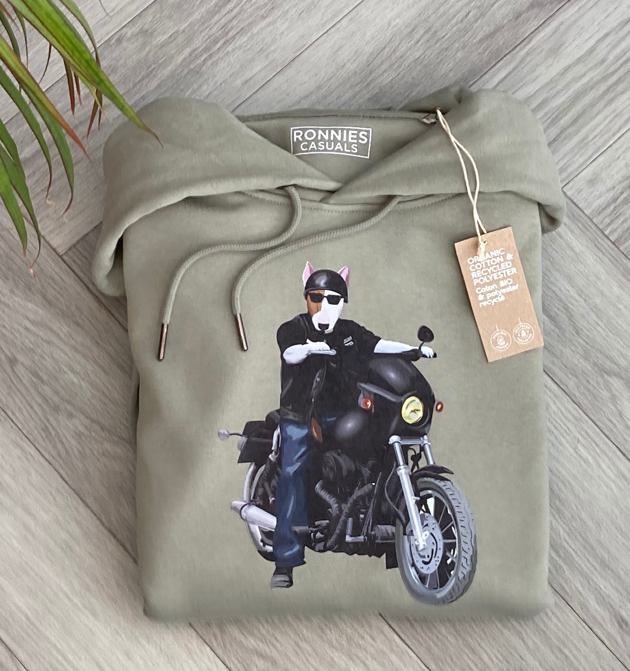 Olive Green Hoodie printed with an English Bull Terrier Dog riding a motorbike wearing a helmet
